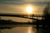 saulriets uz tilta