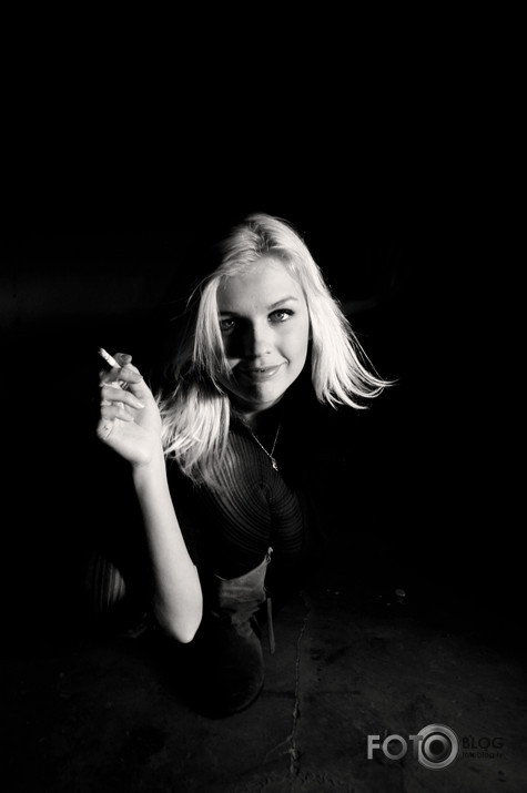 behind a cigarette